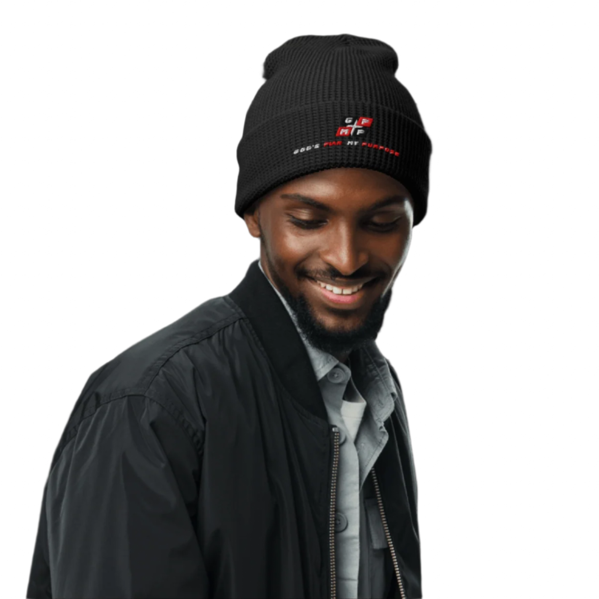 Black Ice Waffle Beanie with honeycomb weave on person against geometric black background.